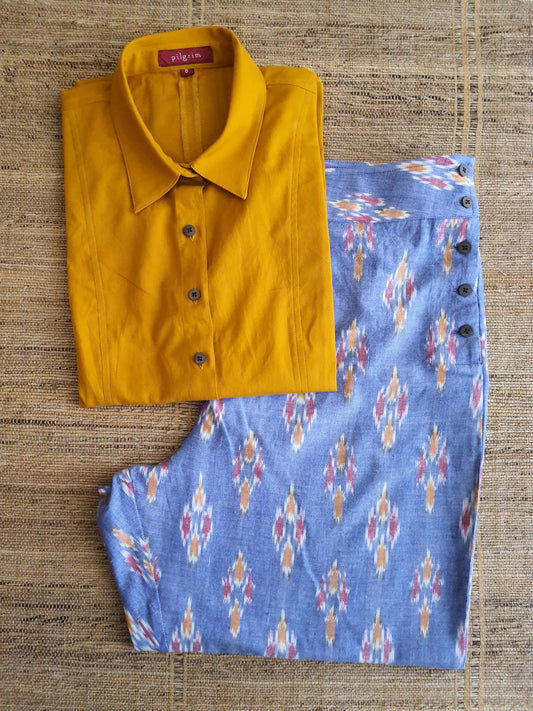 image of a shirt in turmeric cotton, paired with pants in blue ikkat