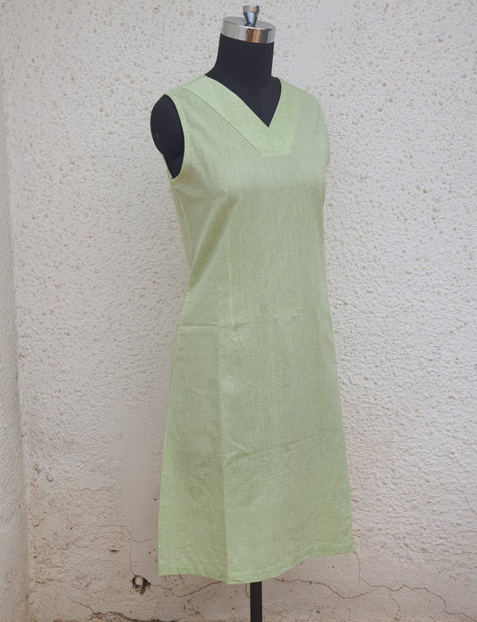 Picture of V necked dress in lime green cotton on a mannequin